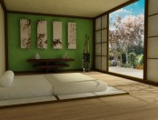 a zen Asian bedroom with a green accent wall, a bed on the floor, a gallery wall with bamboo and a console table of dark wood is a lovely idea