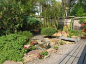 pebbles, rocks, greenery, blooms and bamboo for a Japanese-style yet European garden thanks to blooming plants