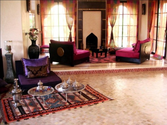 a bright Moroccan living room with colorful furniture, curtains and low tables, with traditional teaware