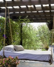 a hanging bed on ropes for one is ideal for a garden, gazebo, patio or any other space