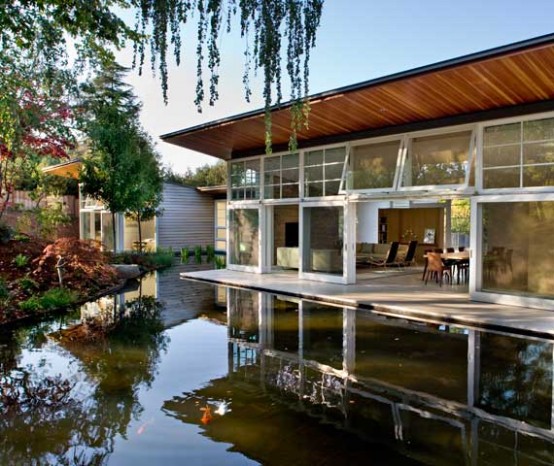 Remodeled House With Large Manmade Pond Near It