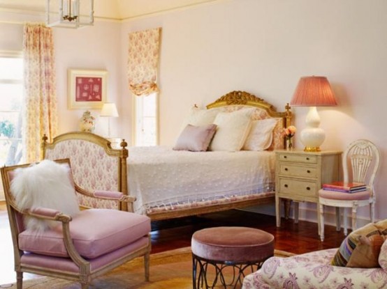 a chic and romantic vintage bedroom with elegant furniture, white and pastel textiles, floral upholstery and some lamps is beautiful