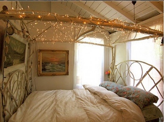 a branch frame with lights over the bed is a cool wy to illuminate the room