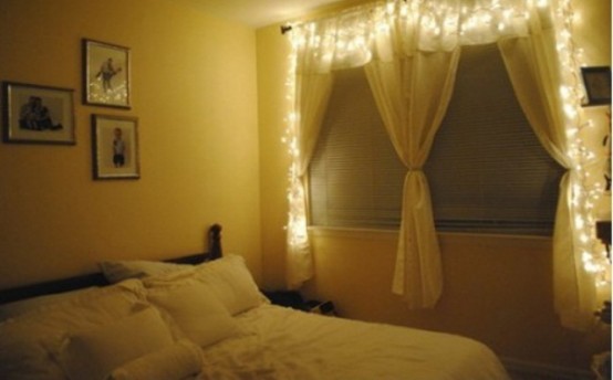 a window with curtains and lights all over is a cool way to bring light but not too much