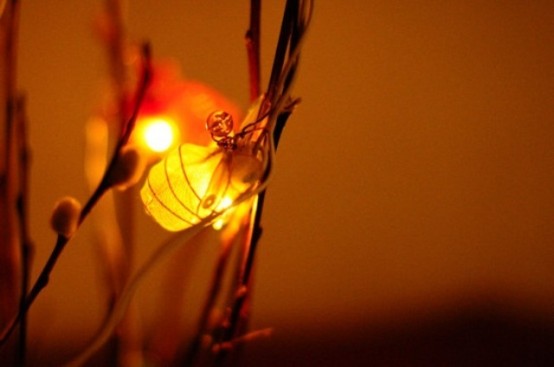 willow branches with lights is a great arrangement idea for any bedroom