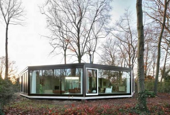 Round Concrete And Wood House To Merge With Nature