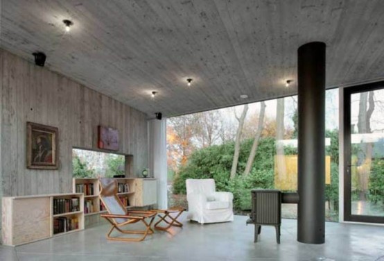Round Concrete And Wood House To Merge With Nature