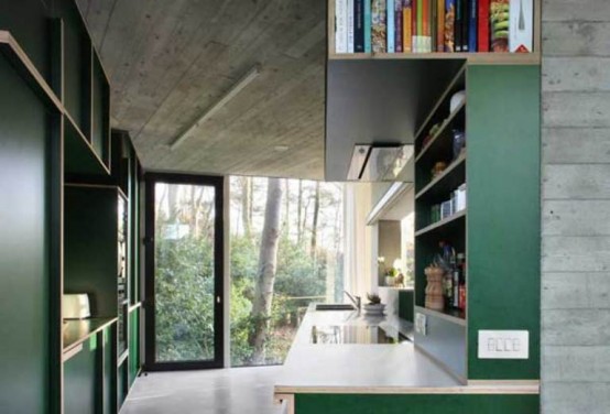 Round Concrete And Wood House To Merge With Nature