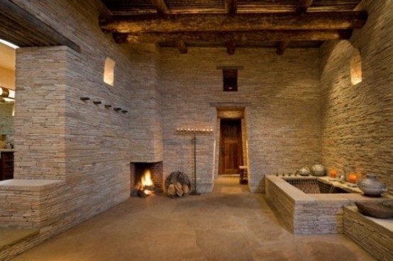 Sculptural Rough Stone Bathroom Design