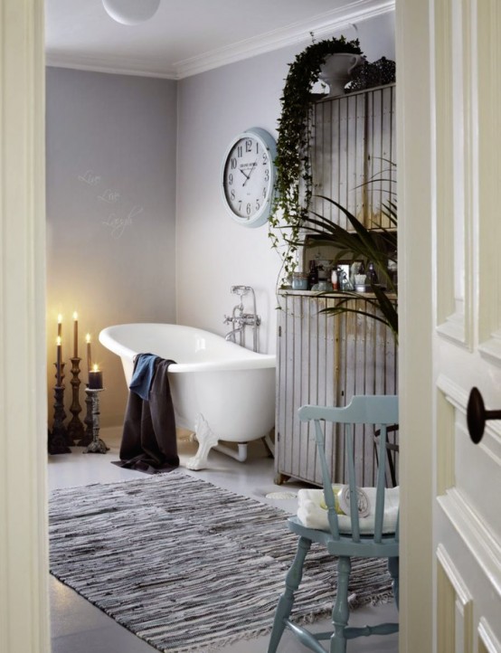 Shabby Chic Bathroom With A Hearth And A Sideboard