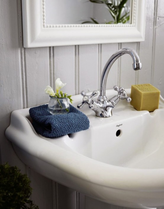 Shabby Chic Bathroom With A Hearth And A Sideboard