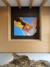Shadow House Of Black Brick With Industrial Decor