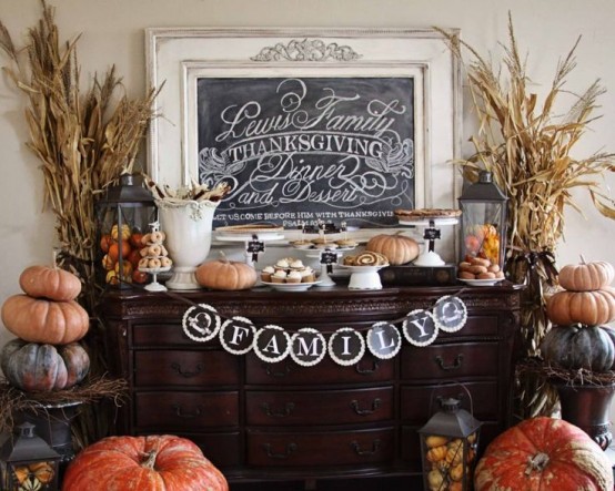a simple and classic black and white paper banner is a cool and contrasting decor idea for fall and Thanksgiving, it looks chic and bold