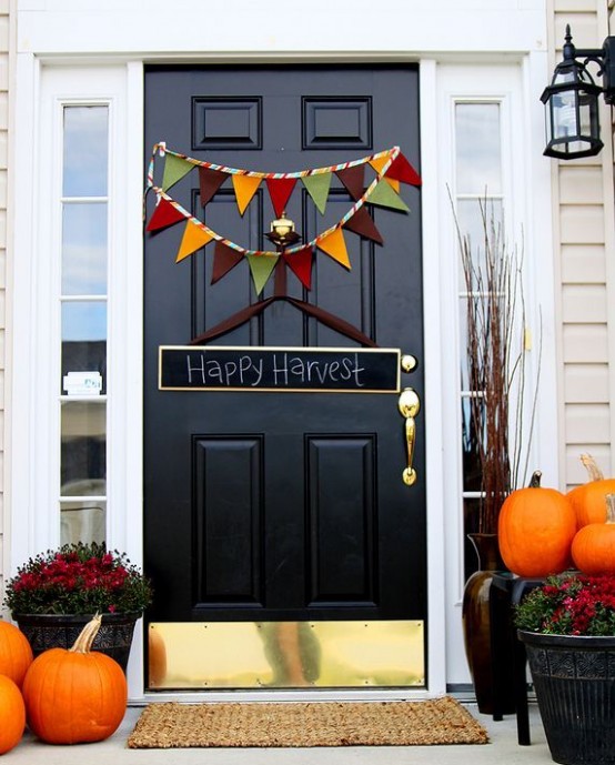 a bright fall-colored fabric banner is a cool decor idea suitable for fall and Thanksgiving is a cool and fun solution for a bold look