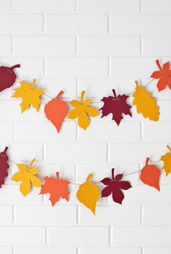 colorful paper fall leaves will be a great idea for a fall or Thanksgiving space, and they can be easily cut out and made cooler
