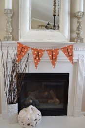 an orange burlap banner with polka dots and painted letters is a stylish and bright idea for the fall and Thanksgiving