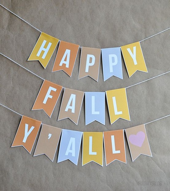 a colorful fall paper banner is a lovely decor idea for Thanksgiving, too, and it's super easy to make yourself