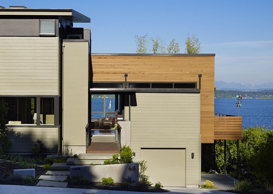 Simple Yet Flexible House Design With a Rooftop Garden That Is Set on Steep Hillside