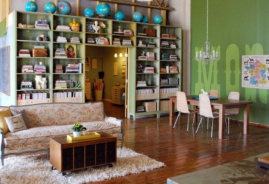 Invest in built-ins to give your living room an organized appearance. Frame a doorway with shelves, cuz otherwise this space would be lost.