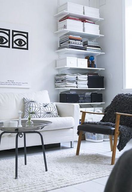Even simple wall-mount shelves could provide lots of storage space. Just make sure to organize them well with different boxes. Otherwise they will look messy.