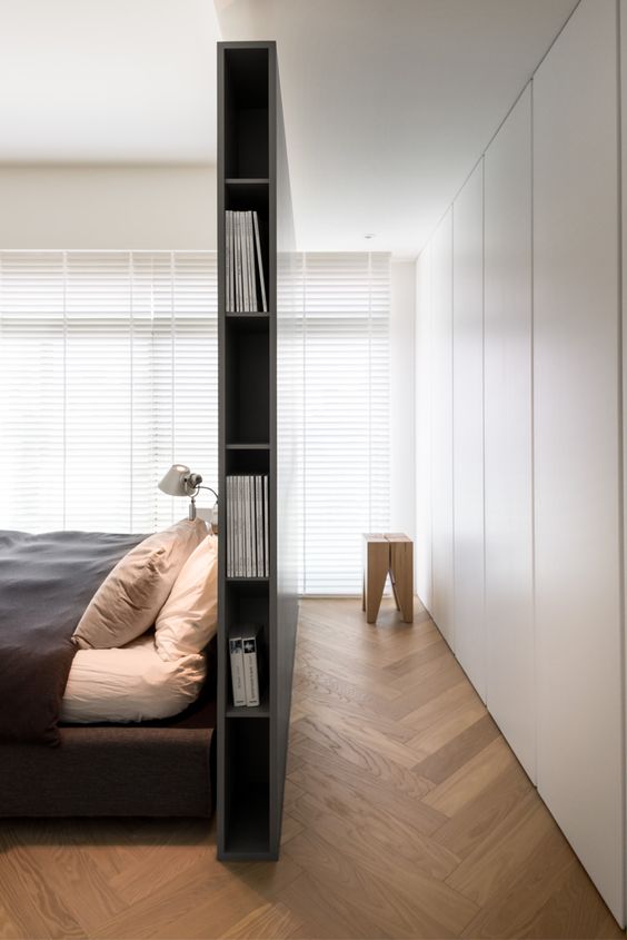 sleek grey masculine headboard with storage