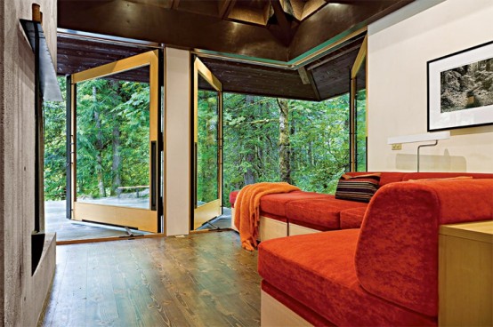 Small And Natural House Design On A River