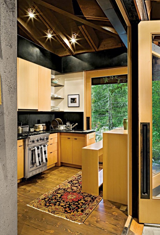 Small And Natural House Design On A River