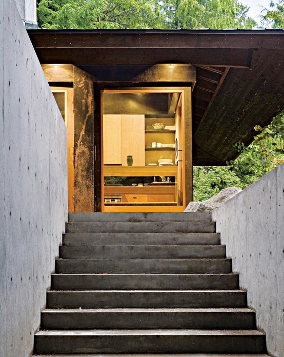 Small And Natural House Design On A River