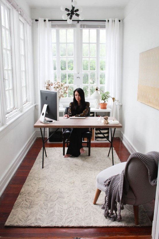 a sunroom turned into a home office guarantees much fresh air, sunshine and inspiration for work