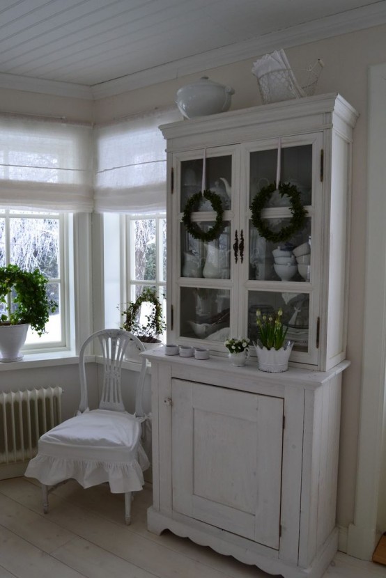 a vintage whitewashed buffet is a beautiful idea for a Scandinavian or shabby chic space and it looks really amazing and beautiful