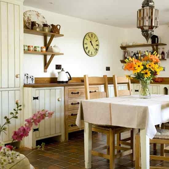 whitewashed kitchen cabinetry is a lovely idea for a farmhouse or rustic space, and it looks simple and very cool