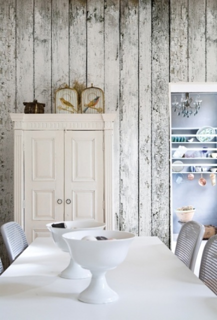 a stylish vintage whitewashed storage unit is a cool and chic idea for a vintage or shabby chic dining space like this one