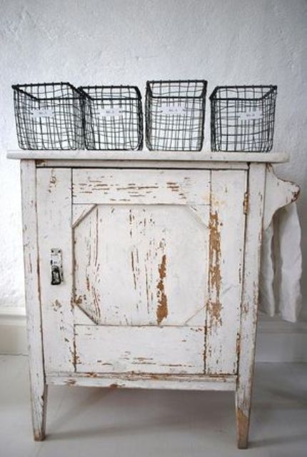 a shabby chic whitewashed cabinet is a lovely and relaxed idea for a shabby chic or vintage space