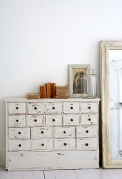 a vintage whitewashed file storage unit is an elegant idea for a vintage space, for a Scandi or shabby chic one