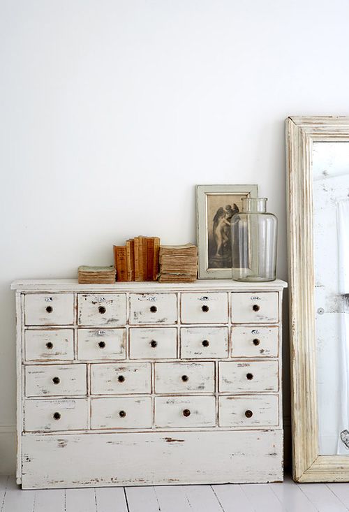 a vintage whitewashed file storage unit is an elegant idea for a vintage space, for a Scandi or shabby chic one