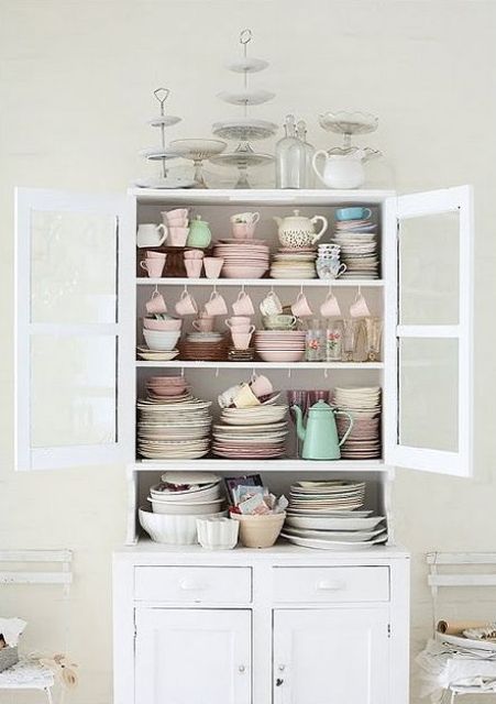 a whitewashed cupboard is always a great idea for a vintage or shabby chic space and it will make your dining room or kitchen more refined
