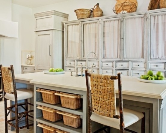 a whole arrangement of vintage whitewashed cabinets with upper parts of glass but with curtains are amazing to build up a vintage kitchen