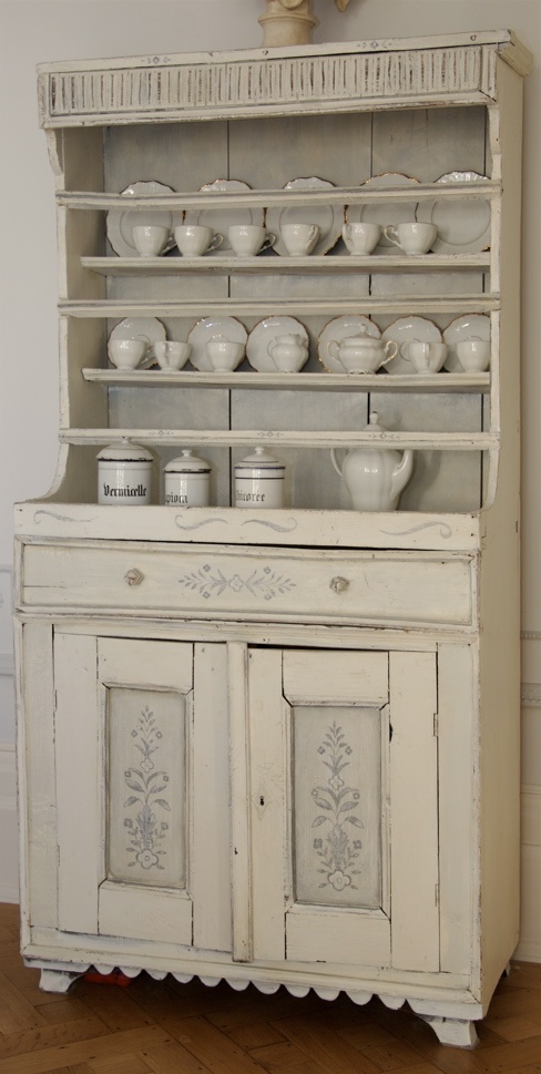 a vintage whitewashed cabinet with open shelves and a closed storage part is a lovely idea for a chic kitchen