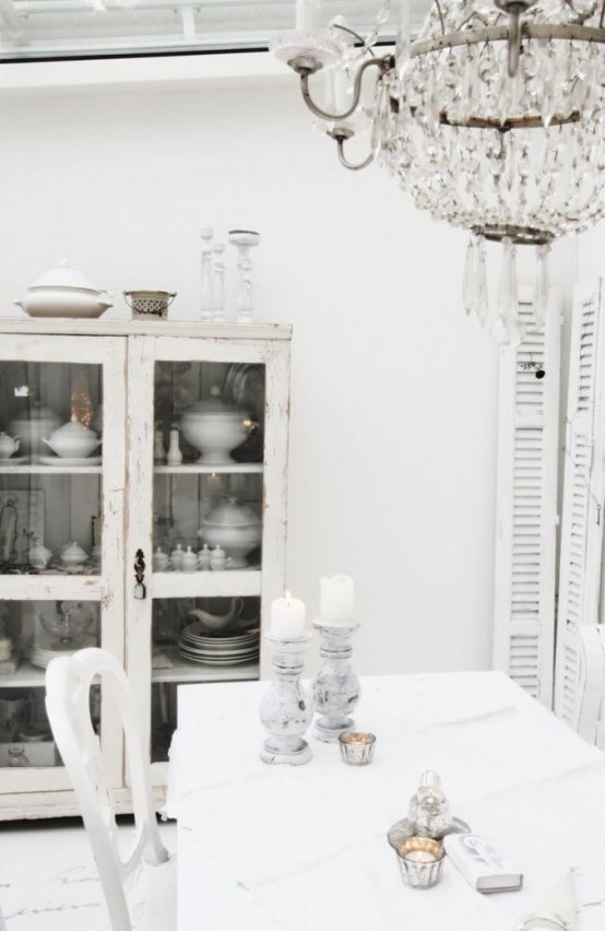 a delicate and beautiful whitewashed shabby chic buffet is a pretty idea of a dining room and it looks cool and fresh