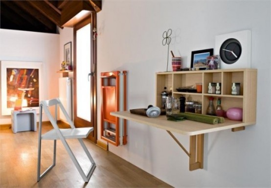 a folding mini desk or bar like that can be used and then hidden back, which is a great idea for a modern space