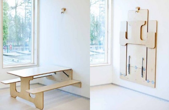 a whole plywood dining set can be attached to the wall when not in need - a great idea for a small space