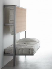 a folding bed is a great piece for a small space, and here it’s a folding bunk bed, perfect for a kid’s or guests’ bedroom