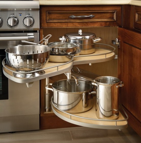 a deep cabinet with a rotating two-tiered stand is a great way to make maximum of your storage space