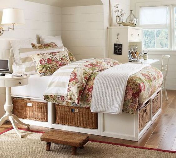 a white rustic-inspired bed with storage drawers is a cool idea for any space, it features a lot of cute storage space