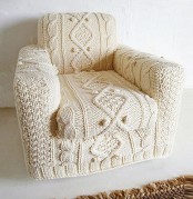 a comfy chair with a white crochet cover will make your space winter-ready and very cozy at the same time