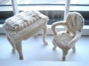 a chair and a mini desk covered with white knit are lovely furniture piece to bring you coziness