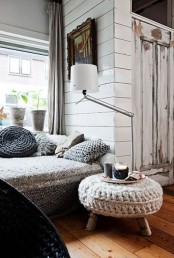 a cool chunky knit ottoman like this one will add coziness to any space and make it very welcoming