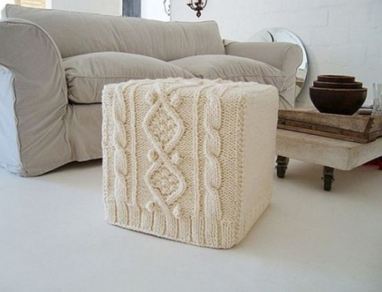 a white knit ottoman will give a touch of coziness to the space and make it more welcoming and winter-ready