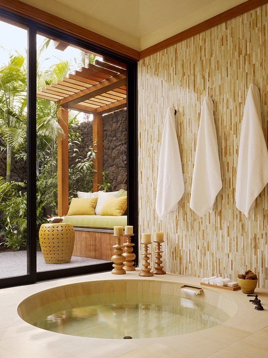 a sunken bathtub clad with tiles can be easily made outdoor with a sliding door that leads to the garden