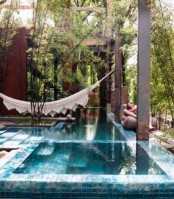 a plunge pool with a hammock over it look and feel very relaxing, just place some loungers on the sides